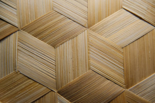Close-up view of a traditional japanese reed screen, showcasing its intricate texture and craftsmanship
