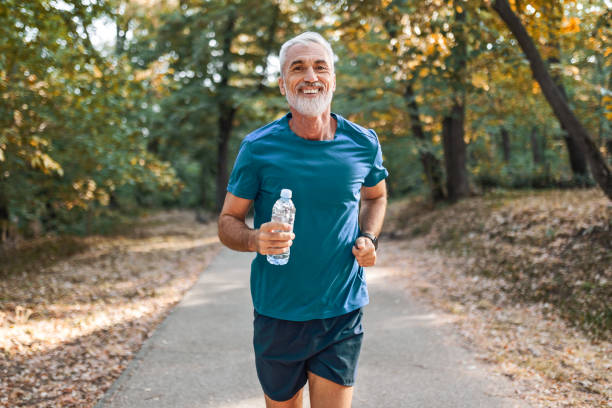 istock Mature Man Running with Energy 2168765664