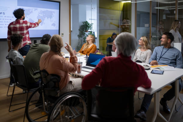istock Businessman giving presentation in conference room 2168769677
