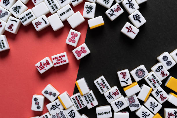 istock Mahjong tiles on a red and black background 2168772220
