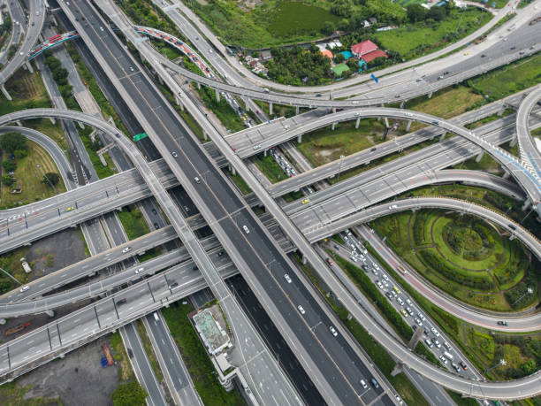 istock Aerial view city junction road with vehicle movement 2168779675