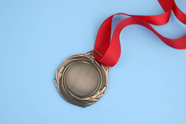 istock Bronze medal with red ribbon 2168787407