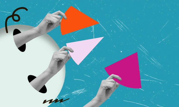 istock Hands assembling colorful geometric shapes against a bright blue background, showcasing creativity during an artistic activity 2168789437