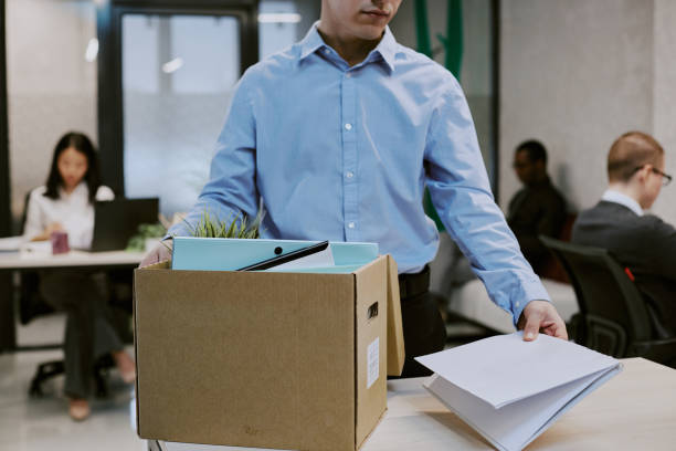 istock New Employee Taking Documents Out Of Box 2168790093