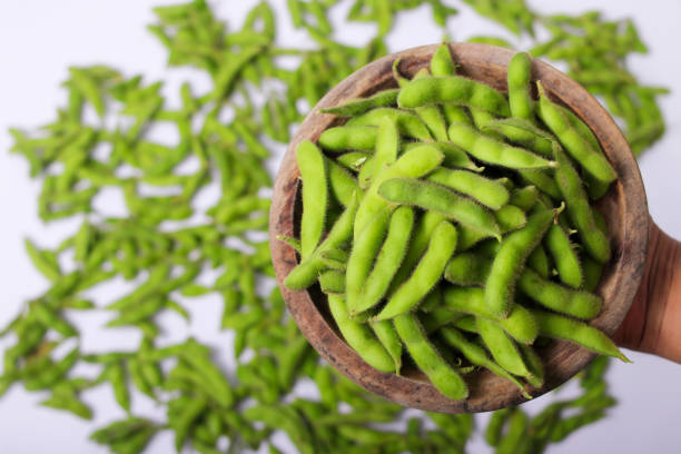 istock Handful of Fresh Edamame Beans 2168792888