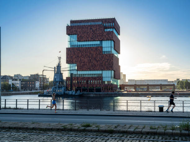 Museum aan de Stroom (MAS) along the river Scheldt in the Eilandje district of Antwerp, at dawn.