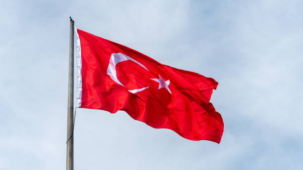 istock Turkish national flag hang on a pole in open air. 2168794050