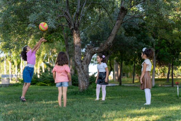istock Children Playing Outdoors: Joyful Moments Together. 2168794294