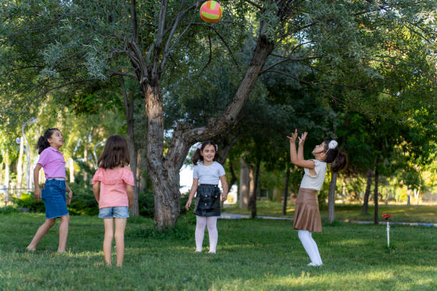 istock Children Playing Outdoors: Joyful Moments Together. 2168794347