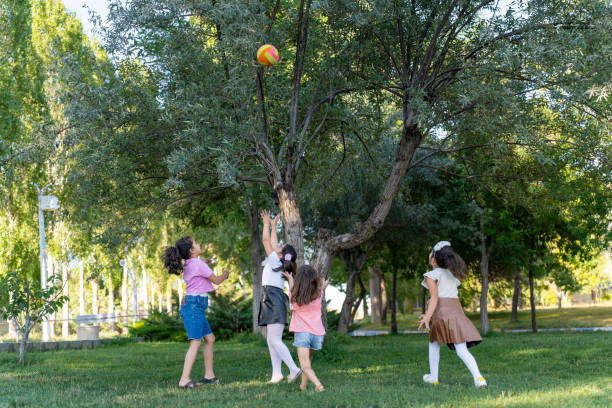 istock Children Playing Outdoors: Joyful Moments Together. 2168794499