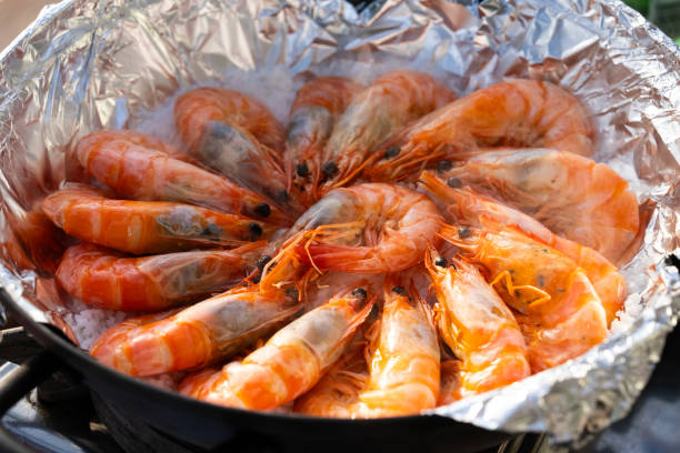 istock roasting shrimps with salt in the pan 2168798421