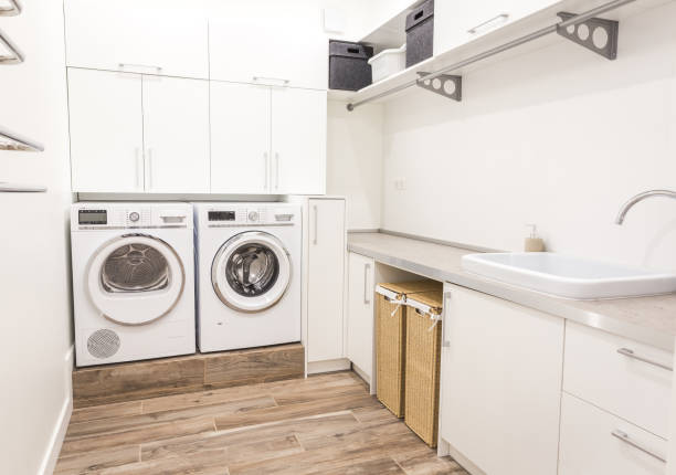 istock Laundry room with washing machine in modern house 2168800149