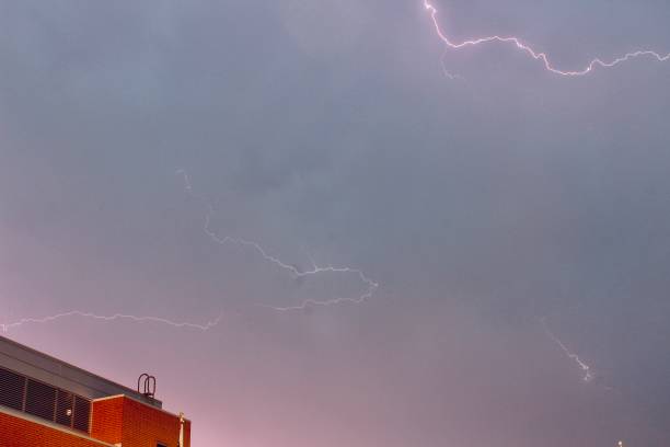 istock Bright, Pink Lightning Bolts as the Sun Begins to Set. 2168800800
