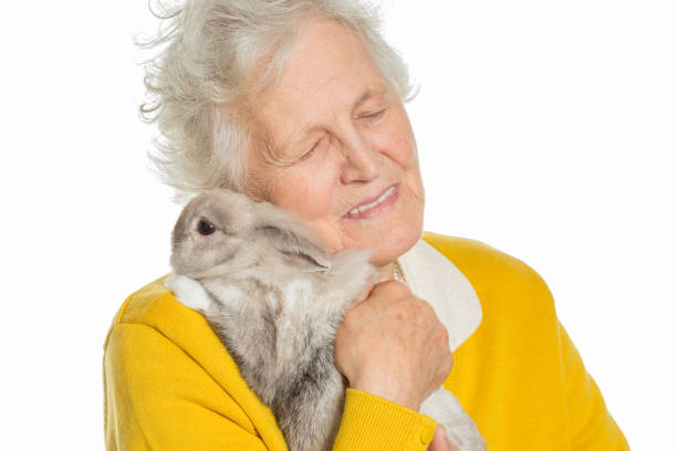 istock Senior woman with pet 2168802370