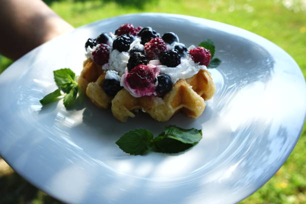 istock A freshly baked waffle topped 2168805944