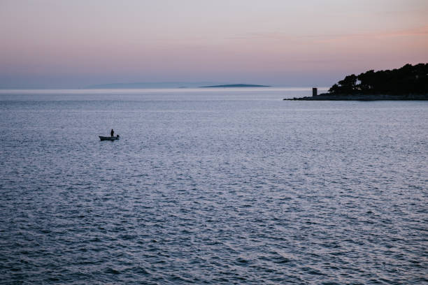 istock Solitary Figure on the Horizon 2168807500