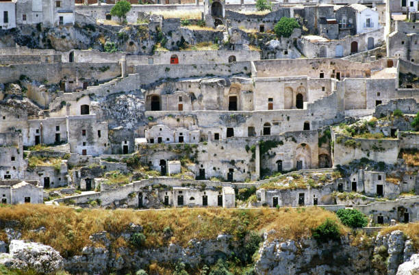 Italy, Matera - The Sassi di Matera are two districts (Sasso Caveoso and Sasso Barisano) of the Italian city of Matera, Basilicata, well-known for their ancient cave dwellings inhabited since the Paleolithic period.