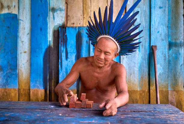 Elderly man plays ancient tribal game to keep his mind active