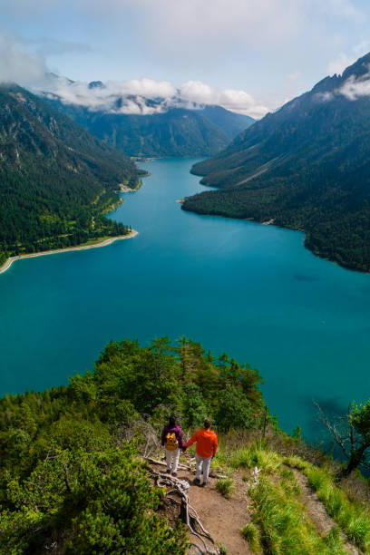 istock Romantic hike alongside Plansee Lake in Austria with stunning mountain views 2168811000