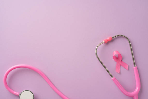 istock A symbolic image featuring a pink stethoscope alongside a pink ribbon on a light pastel background representing breast cancer awareness and health care 2168812099