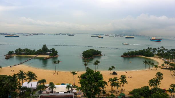 istock Beach resort with ships on the Horizon 2168815703