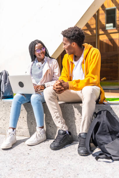 istock African friends using laptop studying online outside the campus 2168816984