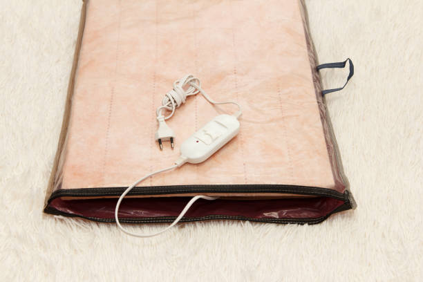 istock A warm two-sided new electric sheet, lying assembled, on a white background. This is a quick and economical way to heat up in cold season 2168820845