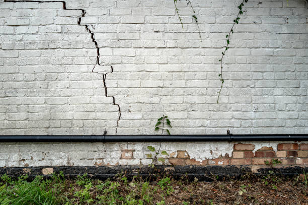 Bad building subsidence seen on an old English cottage. stock photo