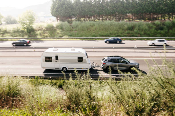 istock Car with camper trailer 2168827707