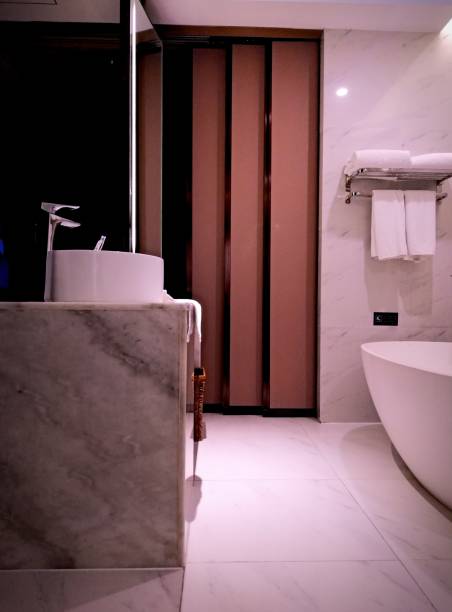 istock Luxury hotel bathroom interior, hot tub and modern sink 2168829421