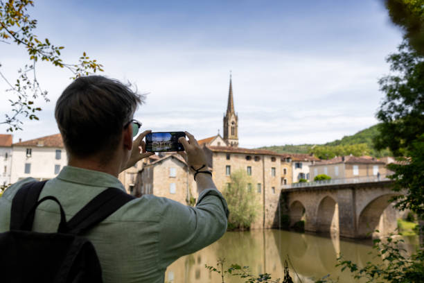 istock Man Taking Photos on His Mobile Phone 2168831991