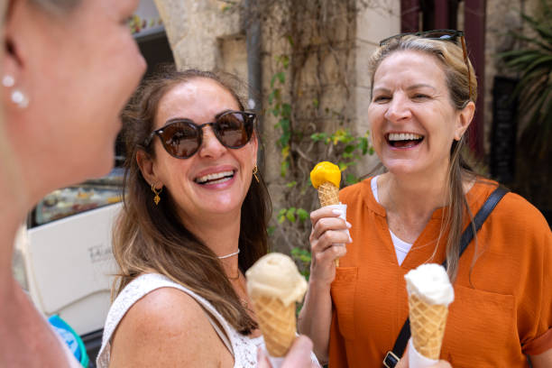 istock Joyful Moments Enjoying Ice Cream with Friends 2168832054