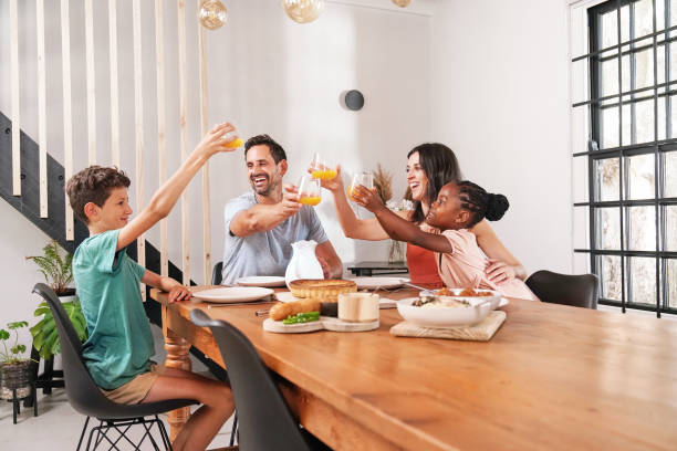 istock Family enjoying meal together 2168833414