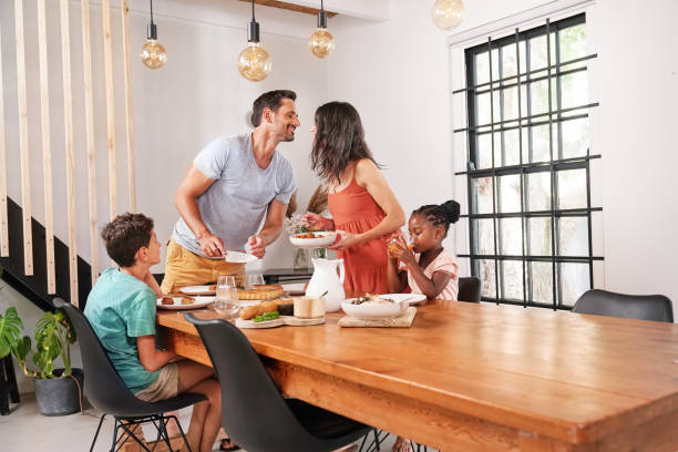 istock Family enjoying meal together 2168833424