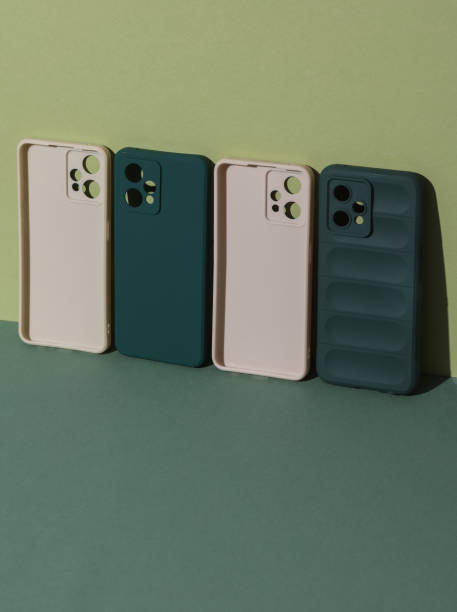 istock Protective cases for smartphones on green background 2168839474