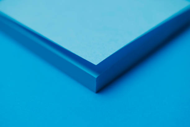 a stack of coloured pads with sticky notes