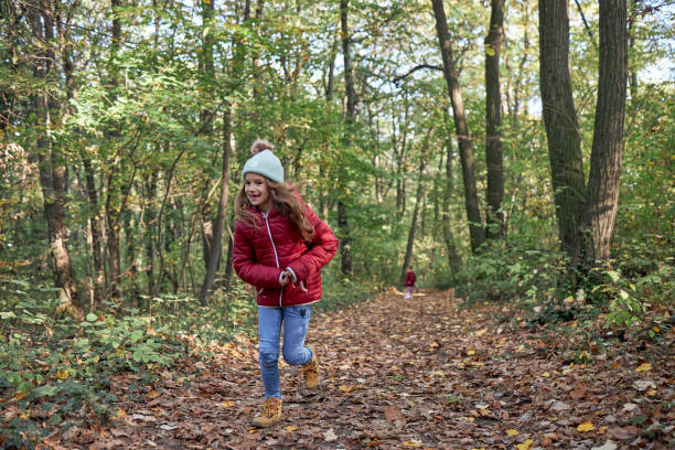 Young girl exploring and relaxing in the nature.