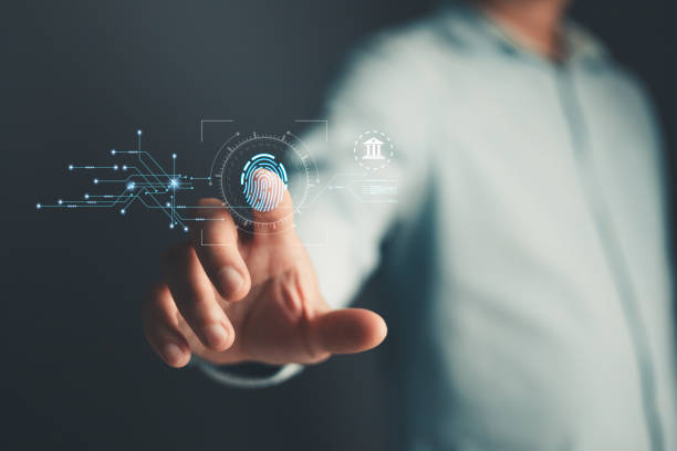 istock Businessman protecting personal data on finger print with virtual screen interfaces. Cyber security and privacy concepts to protect data. Lock icon and internet network security technology. 2168857410