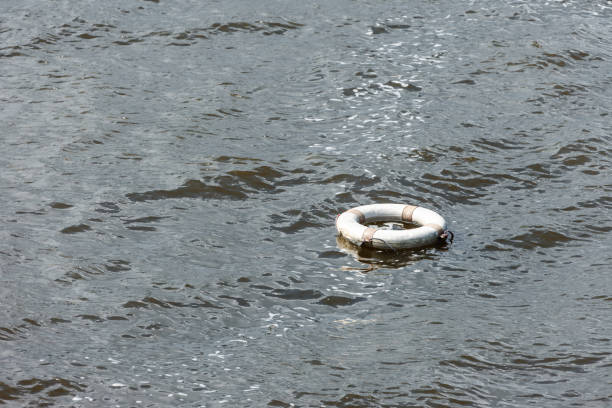 istock Empty rescue buoy floating on water. No people. 2168863539