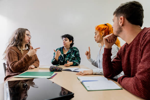 istock Group of people learning sign language at classroom 2168866497