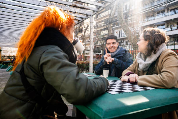 istock Deaf friends communicating in sign language outdoors 2168866617