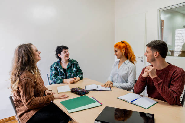 istock Group of students talking in the classroom 2168866931