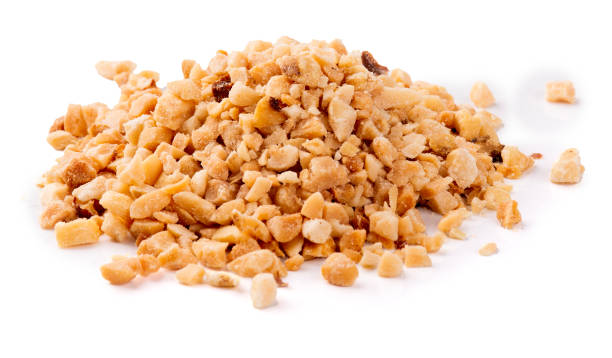 istock handful of crushed peanuts isolated close-up 2168876651