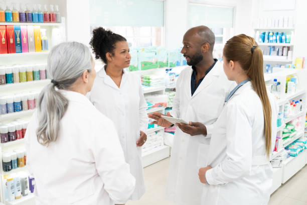 istock Pharmacy staff team meeting 2168877481