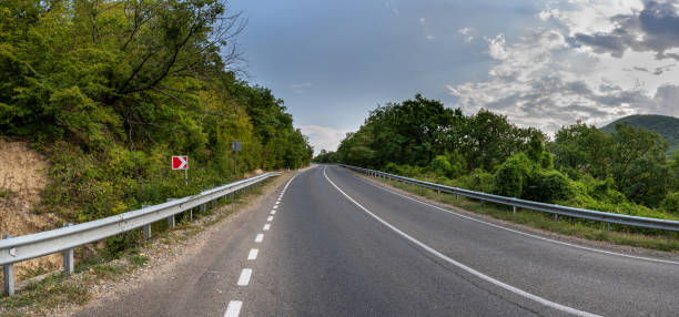 istock Road landscape forest and mountain. 2168878703