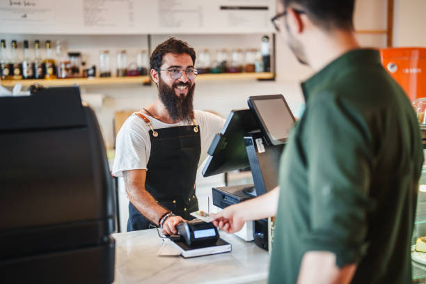 istock Customer paying contactless with credit card 2168879383