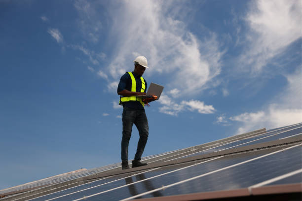 istock Floating Solar panel farm, black male energy engineer and construction inspecting, renewable energy and installation check with the contractor, eco-friendly and sustainable. Solar energy, sustainable innovation, and power maintenance. 2168883941