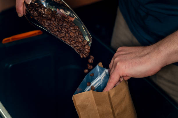 istock The man is packaging roasted coffees ready for sale. 2168884530