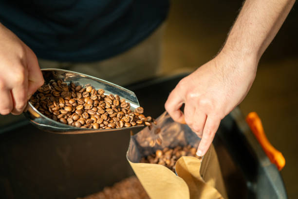 istock The man is packaging roasted coffees ready for sale. 2168884531