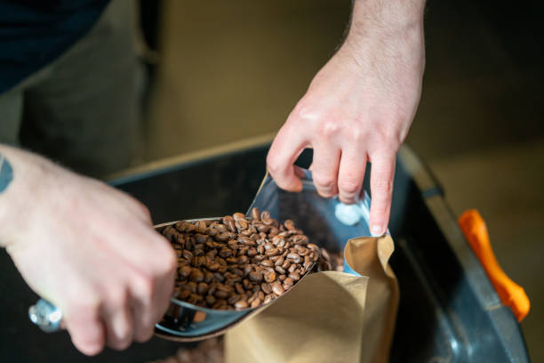 istock The man is packaging roasted coffees ready for sale. 2168884538